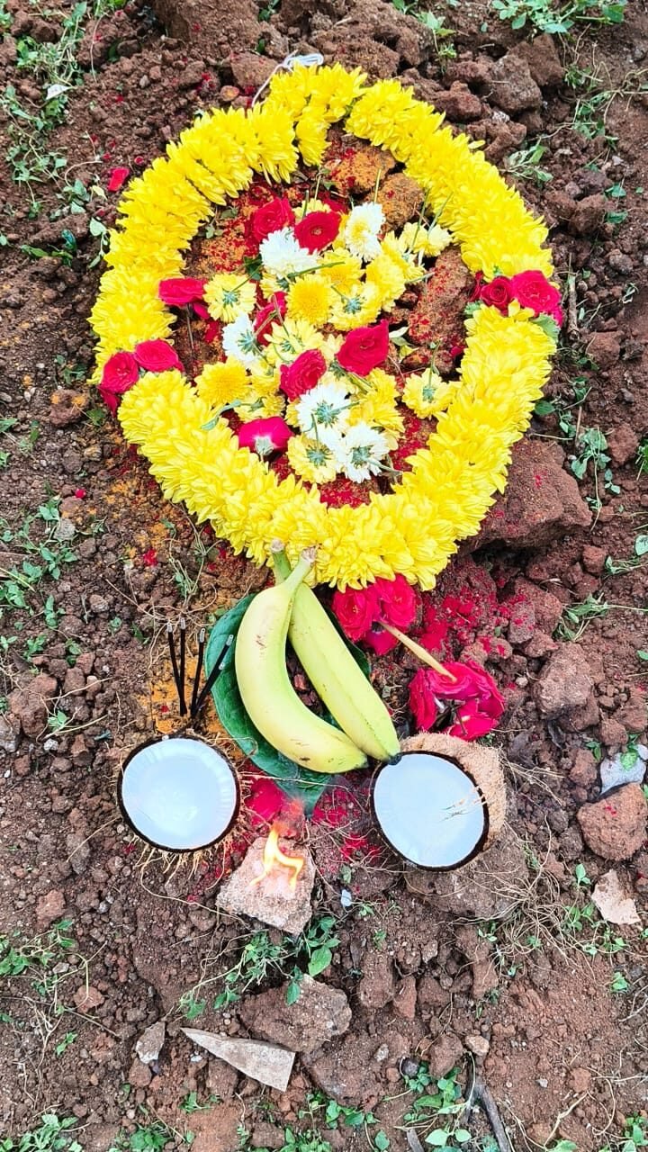 Flower and Pooja offerings for a pet funeral