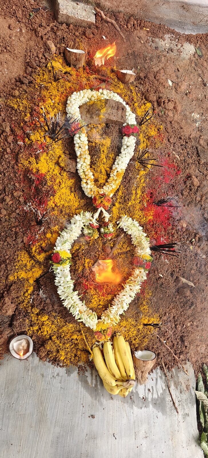 Hindu Pooja ceremony with flower garland for a pet farewell